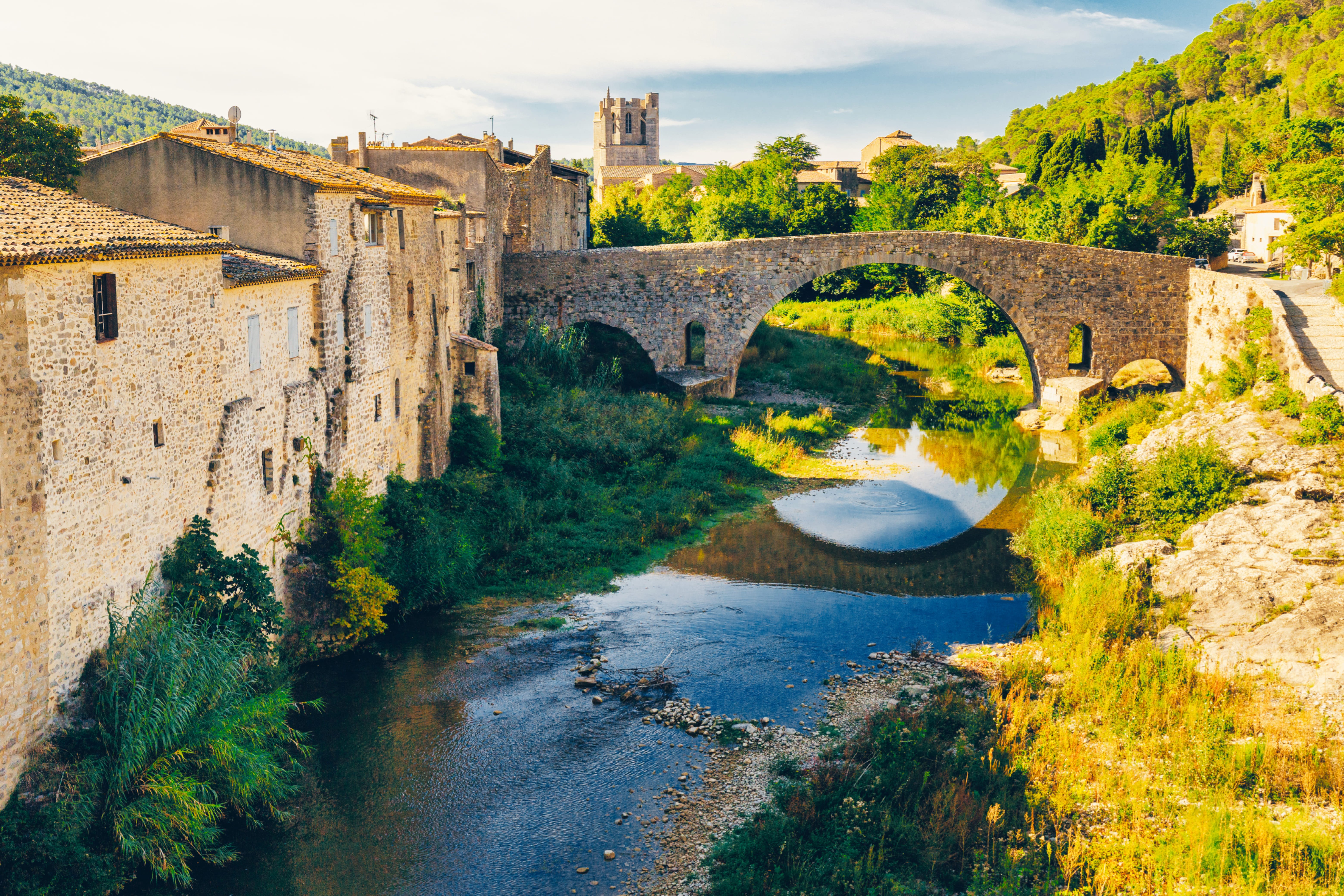 lagrasse france bridge with circle reflection
